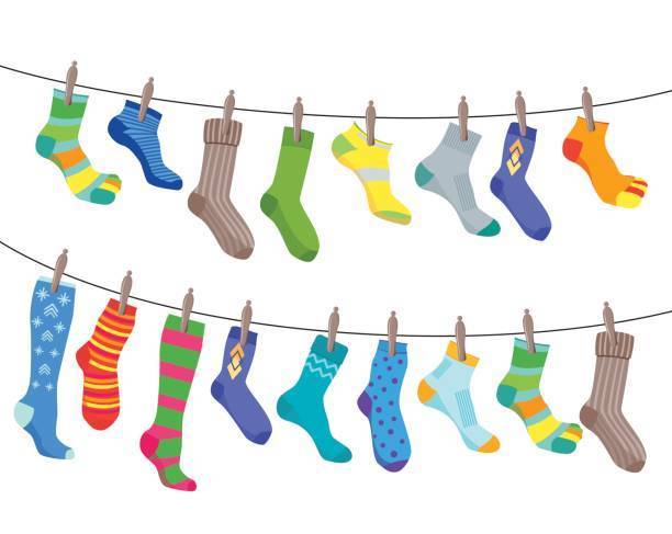 Two lines of colorful socks, in many patterns and sizes.