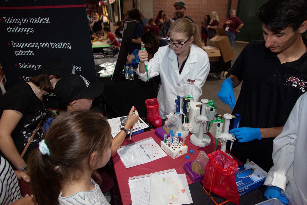 A group of students at a STEM event.